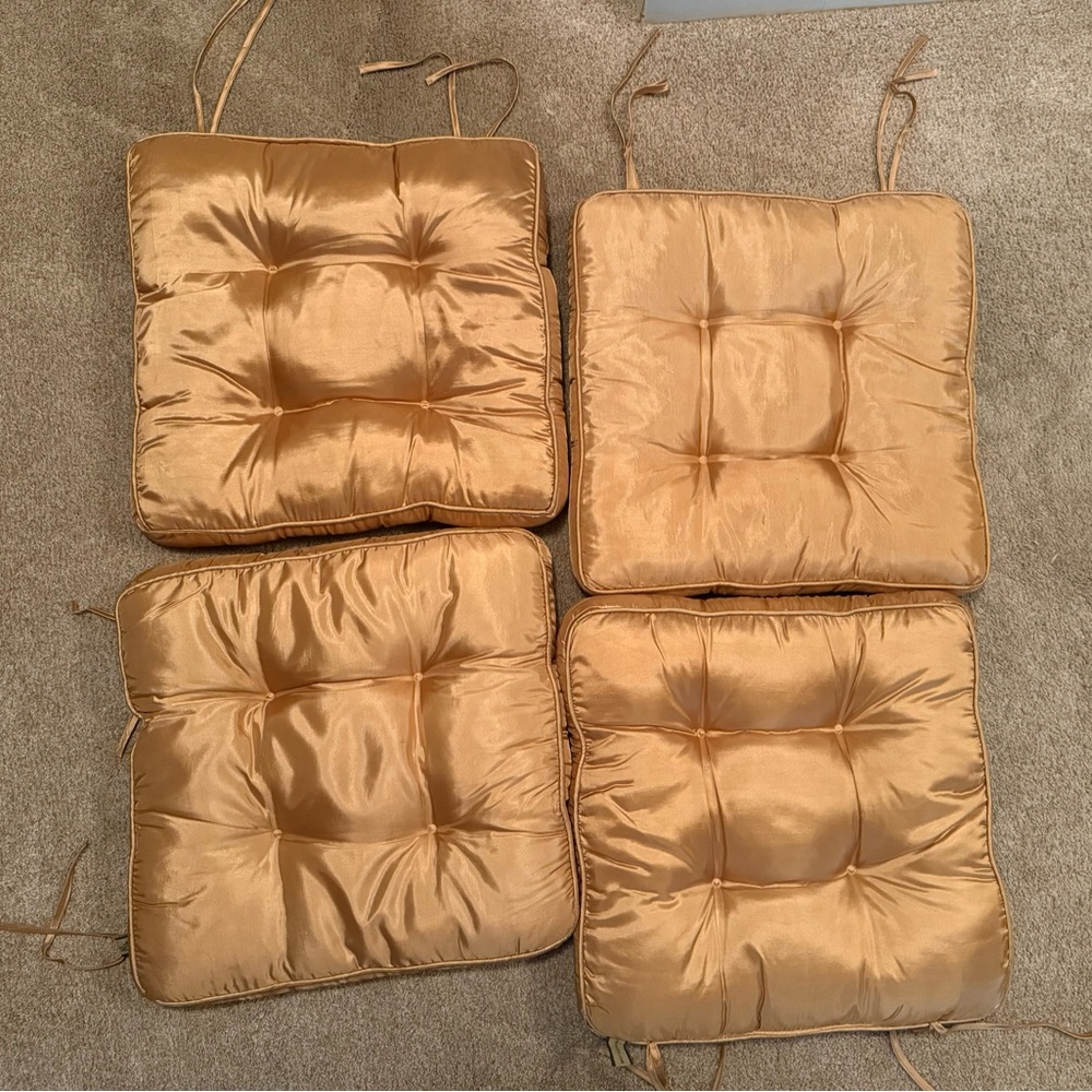 Beautiful gold color chair pads.